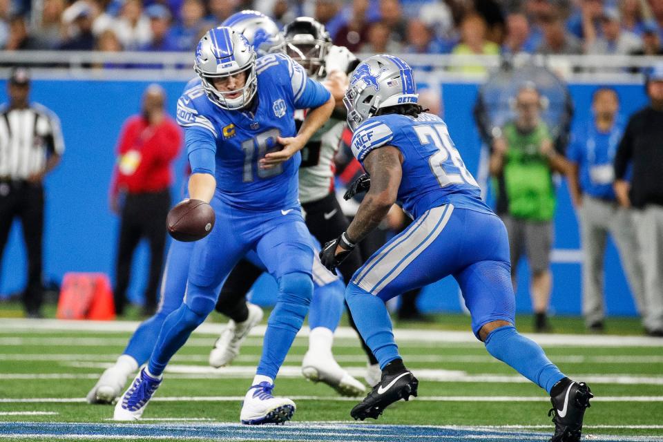 Detroit Lions quarterback Jared Goff (16) hands the ball to running back Jahmyr Gibbs (26) during the second half against Atlanta Falcons at Ford Field in Detroit on Sunday, Sept. 24, 2023.