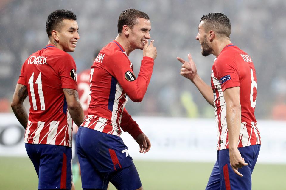 Antoine Griezmann celebrates one of his two goals for Atletico Madrid in the Europa League final. (EFE)