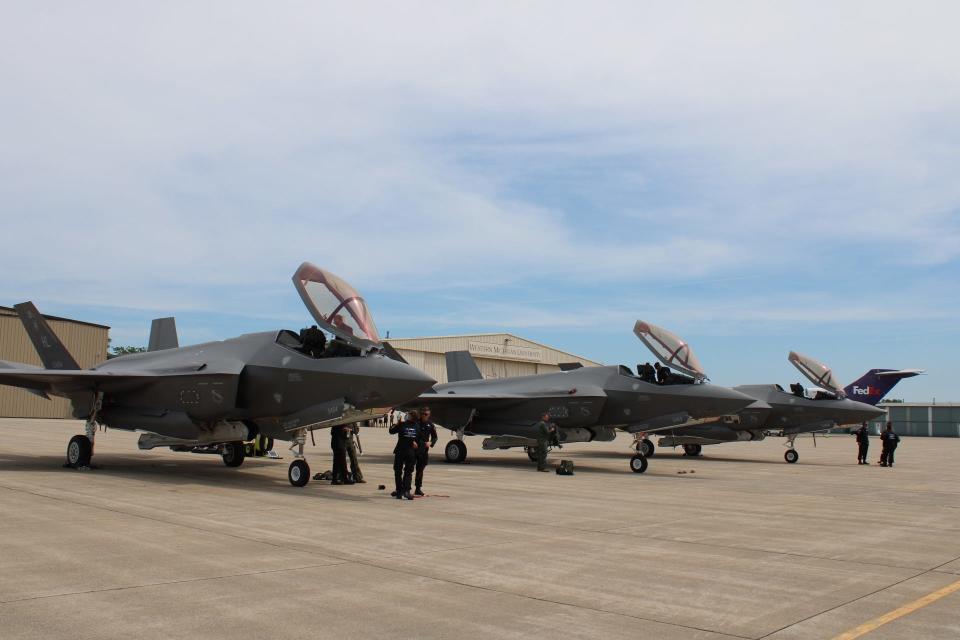 Crews tend to the F-35 Lightning IIs Thursday, June 30, at Battle Creek Executive Airport.