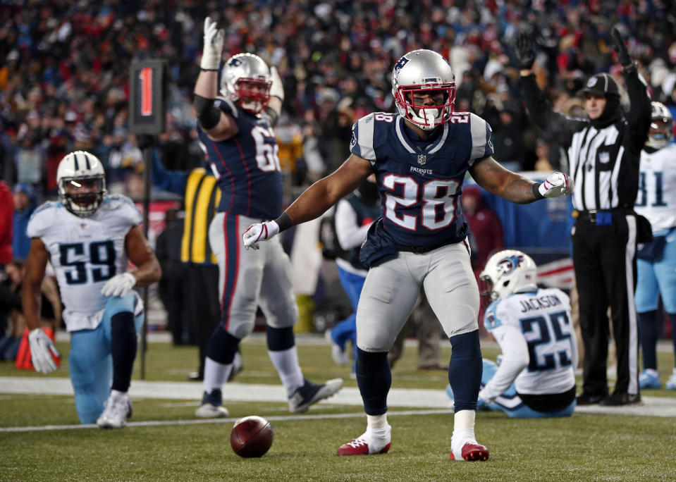 New England Patriots running back James White celebrates a touchdown against the Titans. (AP)