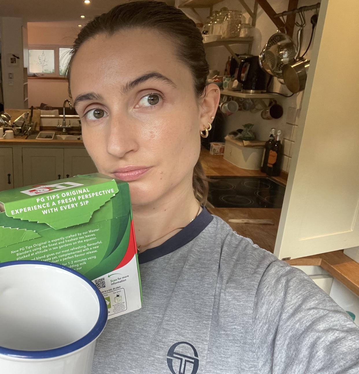 Writer with mug and tea bags. (Yahoo Life UK)