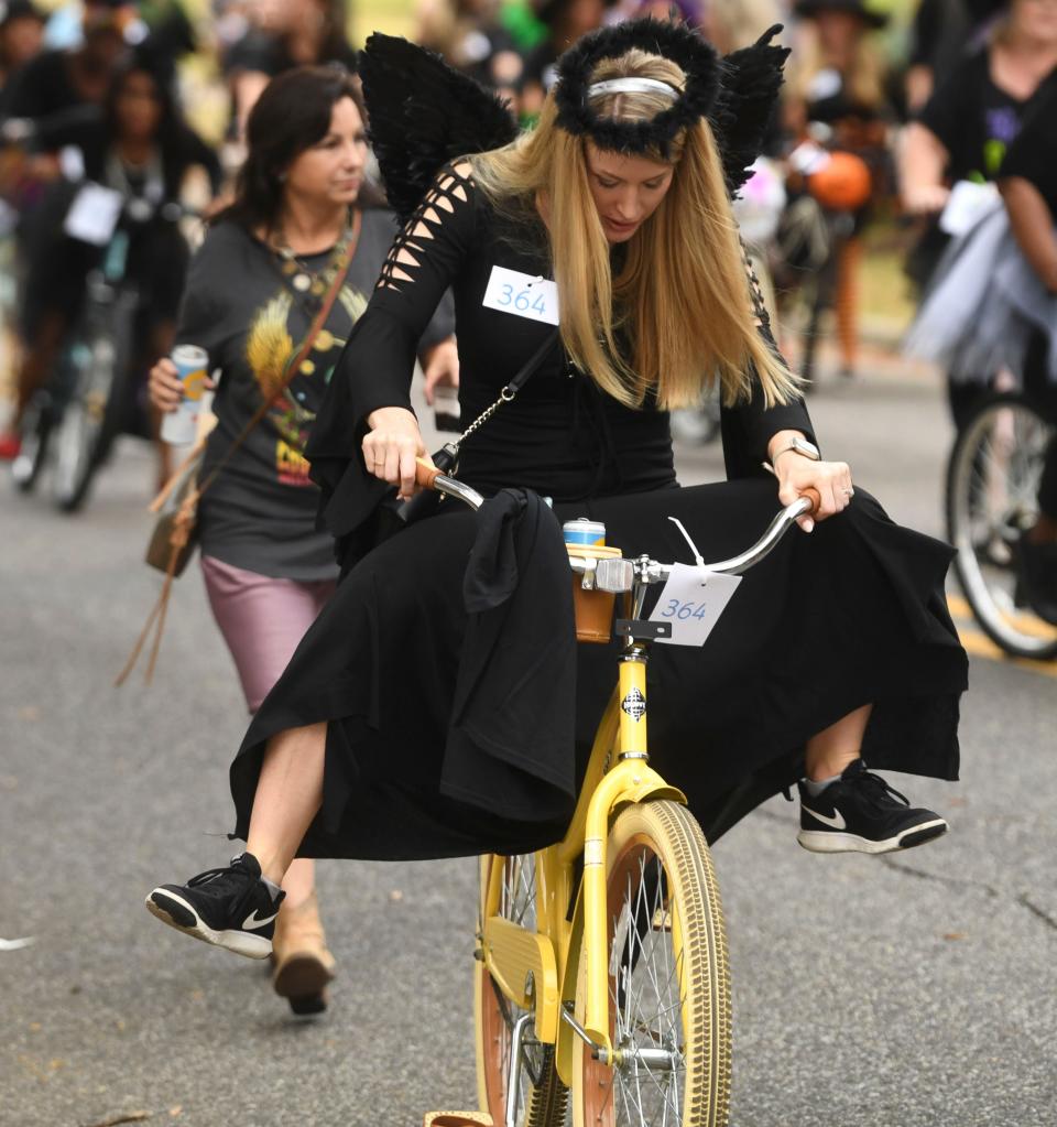 Oct 16, 2022; Tuscaloosa, AL, USA; Witches take flight Sunday in Tuscaloosa to raise money for the Arc of Tuscaloosa County in the annual Witches Ride through downtown. 