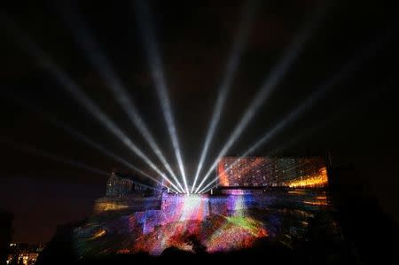 A digital light show called "Deep Time" is beamed onto Edinburgh Castle to mark the start of the Edinburgh Fringe Festival in Edinburgh, Scotland, Britain August 7, 2016. REUTERS/Scott Heppell