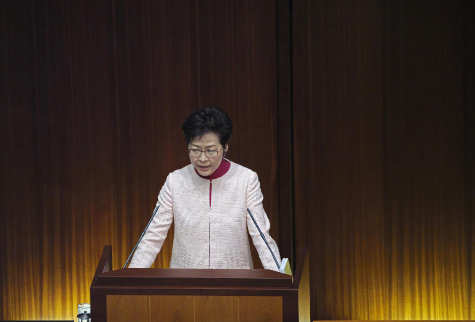 Hong Kong Chief Executive Carrie Lam delivers her policy speech at the Legislative Council in Hong Kong Wednesday, Oct. 10, 2018. Lam has unveiled a major reclamation project called "Lantau Tomorrow Vision," under which about 1,700 hectares will be developed to provide homes for 1.1 million people, according to government radio. (AP Photo/Vincent Yu)