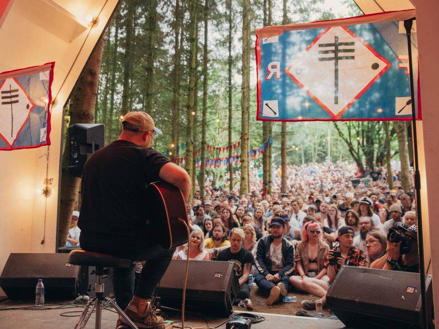 Andy Oliveri plays a Frightened Rabbit song at the Scott Hutchison tribute on the Forest stage (Ben Morse)