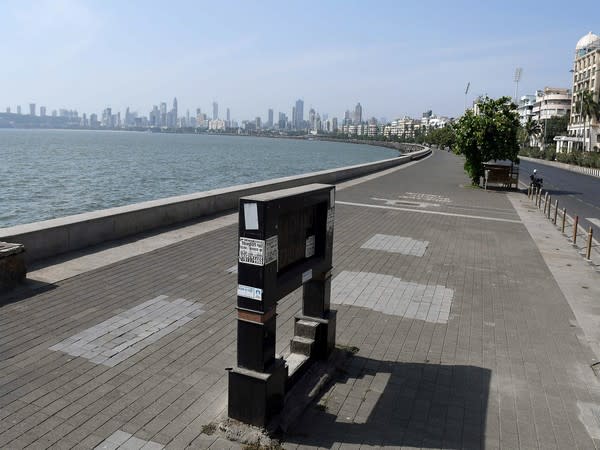 A deserted view of Marine drive Churchgate in Mumbai, after curfew-like restrictions were imposed across Maharashtra. (Photo/ANI)