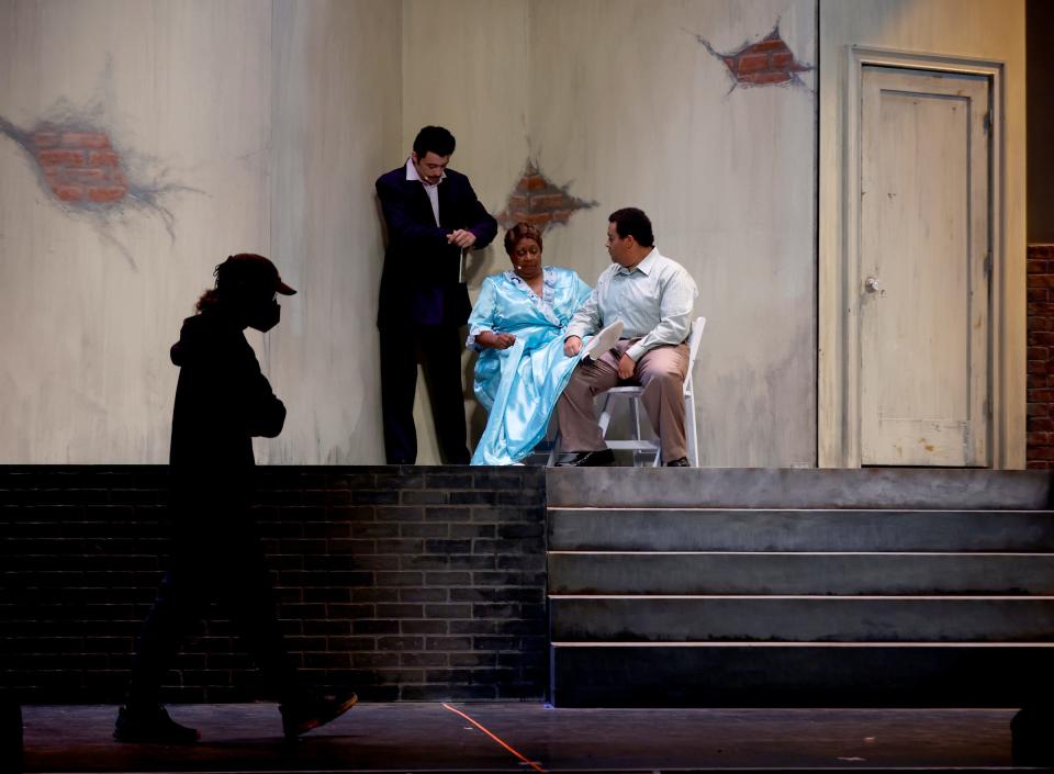 (Left to right) Nick Easterling, Miche Braden and Mark Lemire rehearse lines on stage ahead of the premiere of "Hastings Street" at Music Hall in Detroit on Tuesday, July 19, 2022. The Plowshares Theatre company will stage the jazz musical about the story of Detroit's Black Bottom community July 21-31.