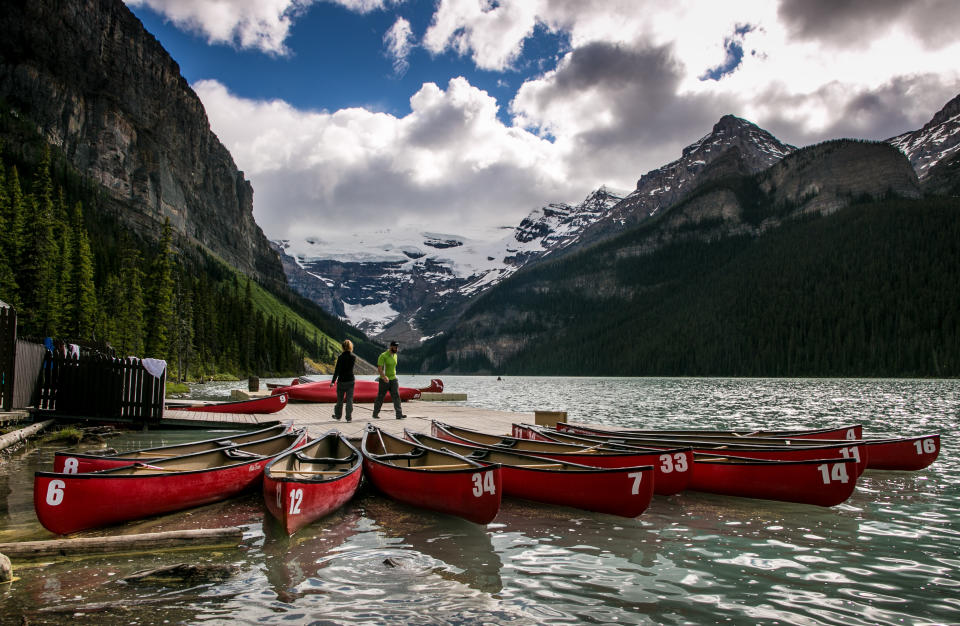 LAKE LOUISE, CANADA - JUNE 26: Canoes are rented at the Fairmont Chateau Lake Louise boathouse on June 26, 2013 in Lake Louise, Alberta, Canada. Major flooding along the Bow River in June washed out the Trans-Canada Highway 1 for nearly a week, forcing park visitors to cancel their vacation plans. (Photo by George Rose/Getty Images)