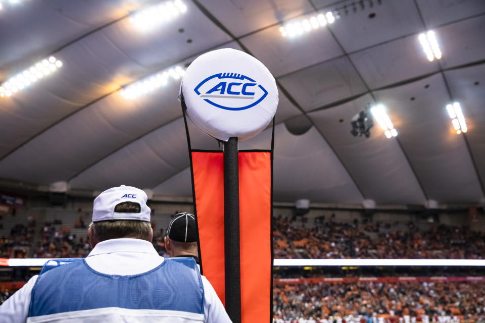 SYRACUSE, NY - OCTOBER 27:  An official stands with a down marker bearing the ACC logo during the game between the Syracuse Orange and the North Carolina State Wolfpack at the Carrier Dome on October 27, 2018 in Syracuse, New York. Syracuse upsets North Carolina State 51-41.  (Photo by Brett Carlsen/Getty Images) *** Local Caption ***