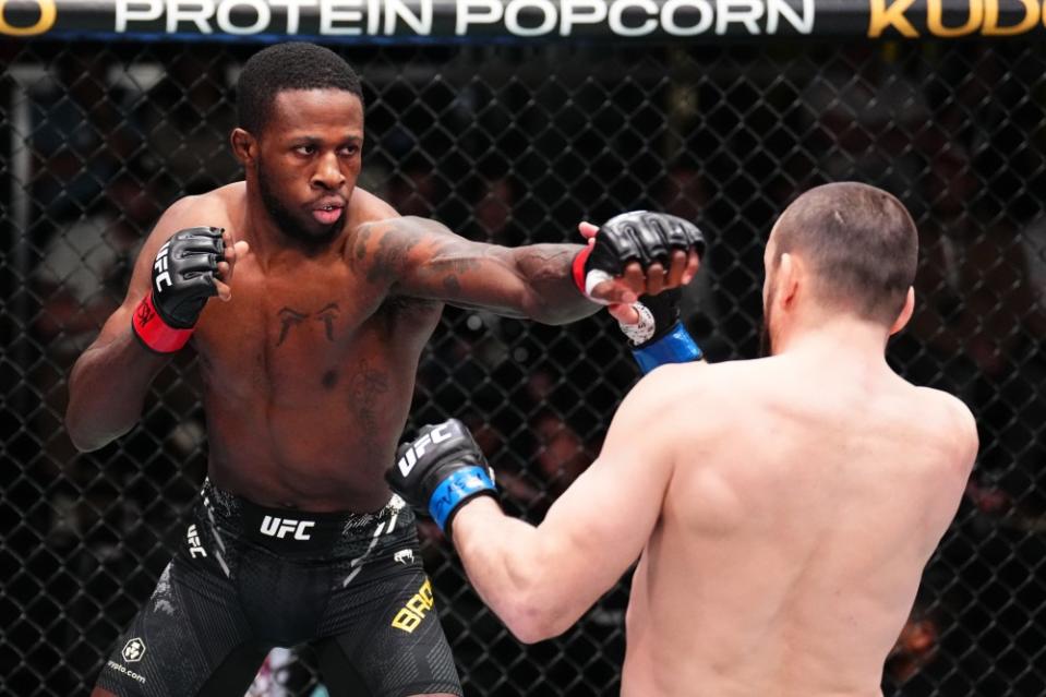 LAS VEGAS, NEVADA – FEBRUARY 03: (L-R) Randy Brown of Jamaica punches Muslim Salikhov of Russia in a welterweight fight during the UFC Fight Night event at UFC APEX on February 03, 2024 in Las Vegas, Nevada. (Photo by Chris Unger/Zuffa LLC via Getty Images)