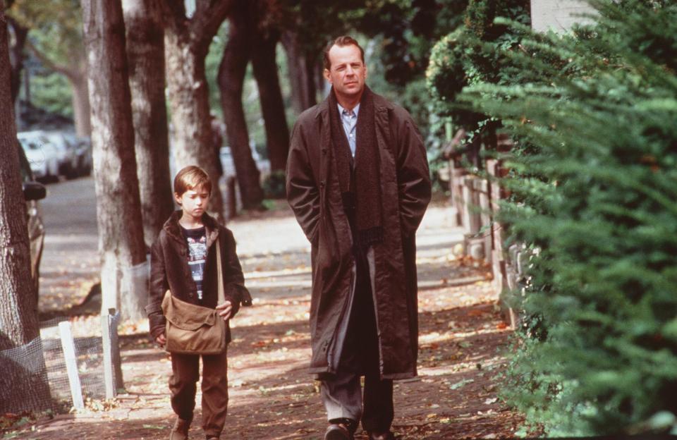 Haley Joel Osment And Bruce Willis Star In "The Sixth Sense."