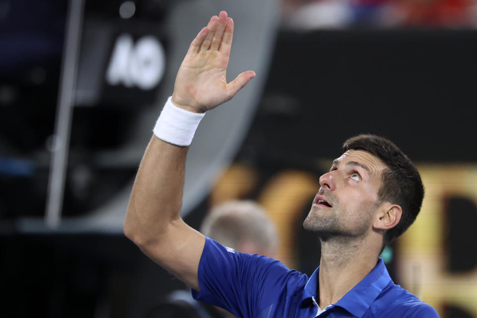 Novak Djokovic of Serbia celebrates after defeating Tomas Martin Etcheverry of Argentina in their third round match at the Australian Open tennis championships at Melbourne Park, Melbourne, Australia, Friday, Jan. 19, 2024. (AP Photo/Asanka Brendon Ratnayake)