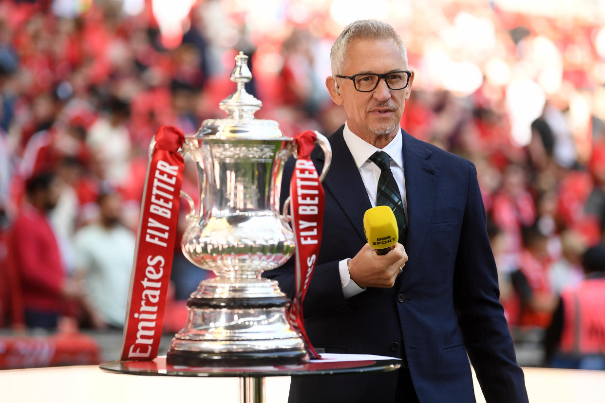 LONDON, ENGLAND - APRIL 16: Sports Broadcaster, Gary Lineker looks on next to the FA Cup trophy prior to The Emirates FA Cup Semi-Final match between Manchester City and Liverpool at Wembley Stadium on April 16, 2022 in London, England. (Photo by Michael Regan - The FA/The FA via Getty Images)