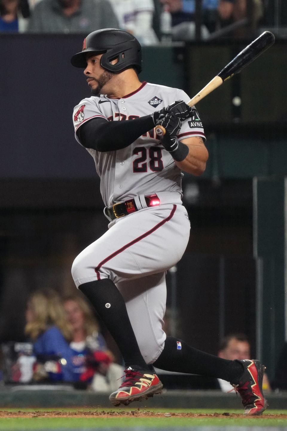 Arizona Diamondbacks designated hitter Tommy Pham (28) hits a single during the eighth inning against the Texas Rangers in game two of the 2023 World Series at Globe Life Field on Oct. 28, 2023, in Arlington, Texas.