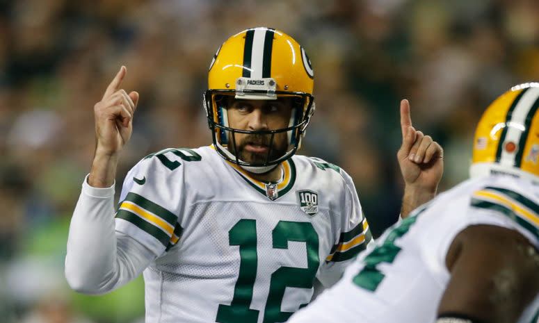 A closeup of Green Bay Packers QB Aaron Rodgers during a game.