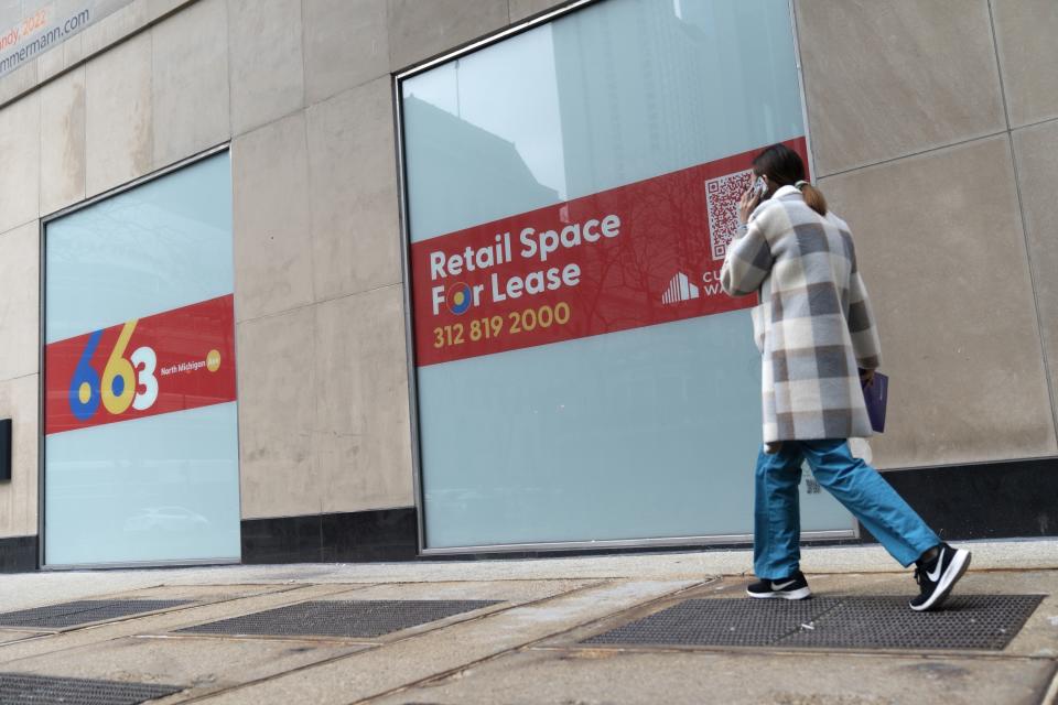 Retail space is vacant along Michigan Avenue Thursday, March 23, 2023, in Chicago. Along the iconic shopping and tourist strip known as the Magnificent Mile, storefronts sit vacant, casualties of the pandemic, crime and retail trends that were moving away from in-person shopping even before COVID-19. (AP Photo Erin Hooley)