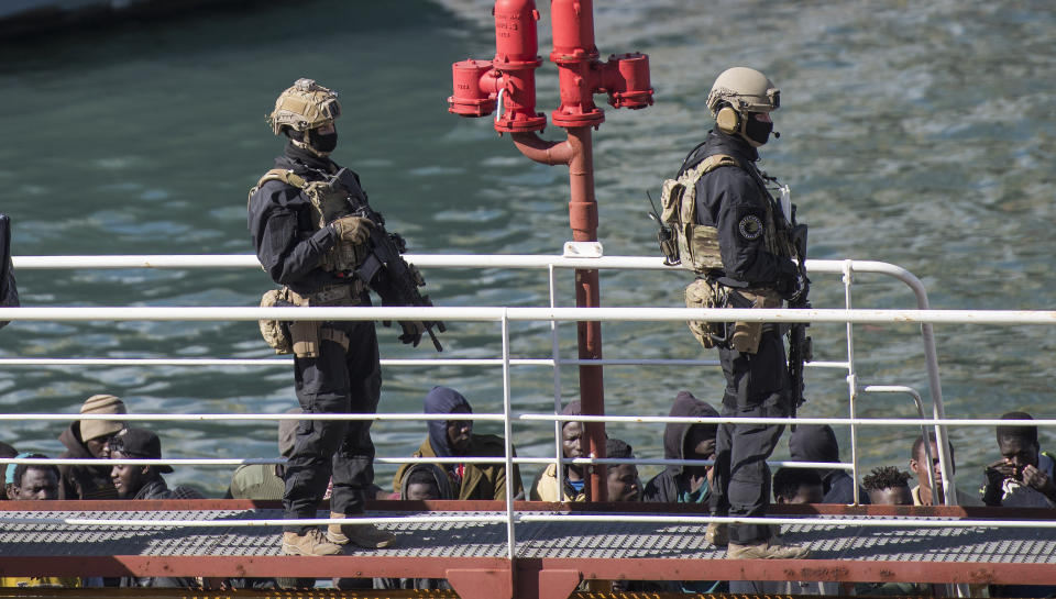 Armed forces stand onboard the Turkish oil tanker El Hiblu 1, which was hijacked by migrants, in Valletta, Malta, Thursday March 28, 2019. A Maltese special operations team boarded a tanker Thursday that had been hijacked by migrants rescued at sea and recaptured control of it before escorting it to a Maltese port. Italy's hard-line interior minister slammed the migrants as pirates but aid groups rejected that label, saying the European Union's policy of sending migrants back to lawless Libya was to blame. (AP Photo/Rene' Rossignaud)