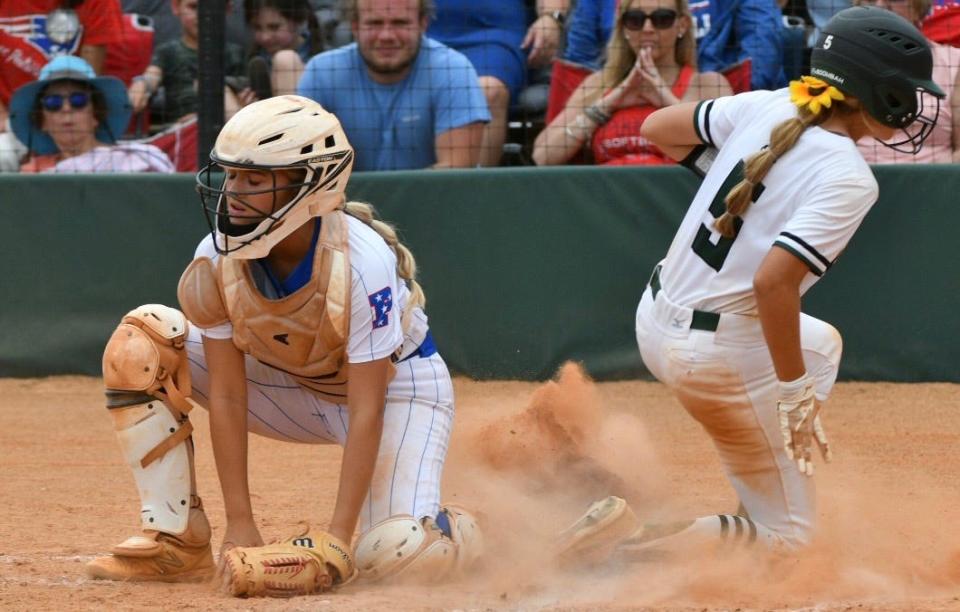 Hailey Turner scores the winning run on a bunt in the bottom of the eighth inning during the game against Pace Friday, May 27, 2022. 