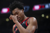 Toronto Raptors' Scottie Barnes reacts to his team's loss in an NBA basketball game against the Boston Celtics Sunday, Nov. 28, 2021 in Toronto. (Chris Young/The Canadian Press via AP)