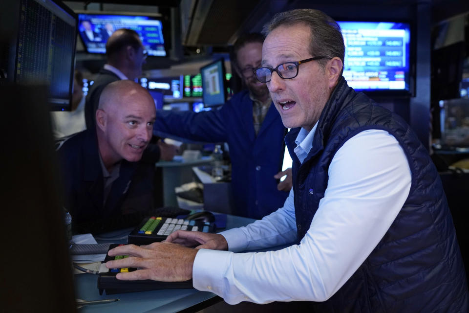 Specialists John O'Hara, left, and Glenn Carell work on the floor of the New York Stock Exchange, Friday, July 23, 2021. Stocks rose in early trading on Wall Street Friday and put the major indexes on track for a strong finish in a week that opened with a stumble. (AP Photo/Richard Drew)