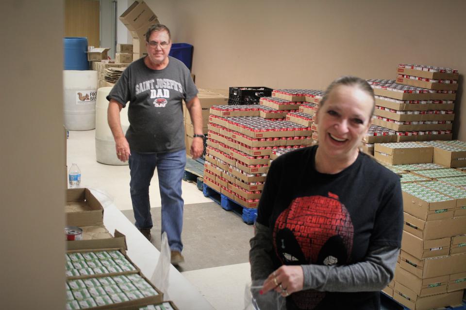 Set Free Ministries volunteers offer their time to the Great Falls Community Food Bank to help build food boxes
