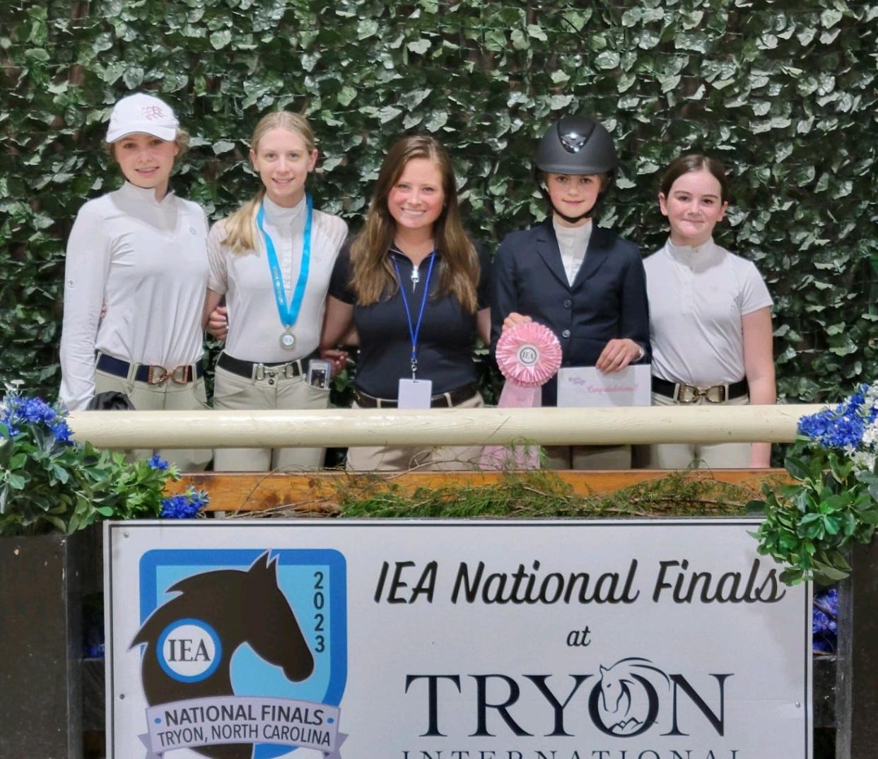 Riders from Stonehaven Farms in Temperance competed at Hunt Seat National Finals in Tryon, N.C. Pictured are, from left, Rylee Frederick,  Taytum Schoch,  IEA team coach Samantha Rothman, Kendyl Delp-Hartbarger and Vivienne Walrod.