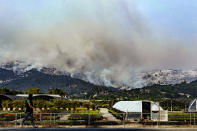 <p>A girl walks past a nursery just south of Carpinteria High School on HWY 192 (Photo: Santa Barbara News-Press via ZUMA Wire) </p>