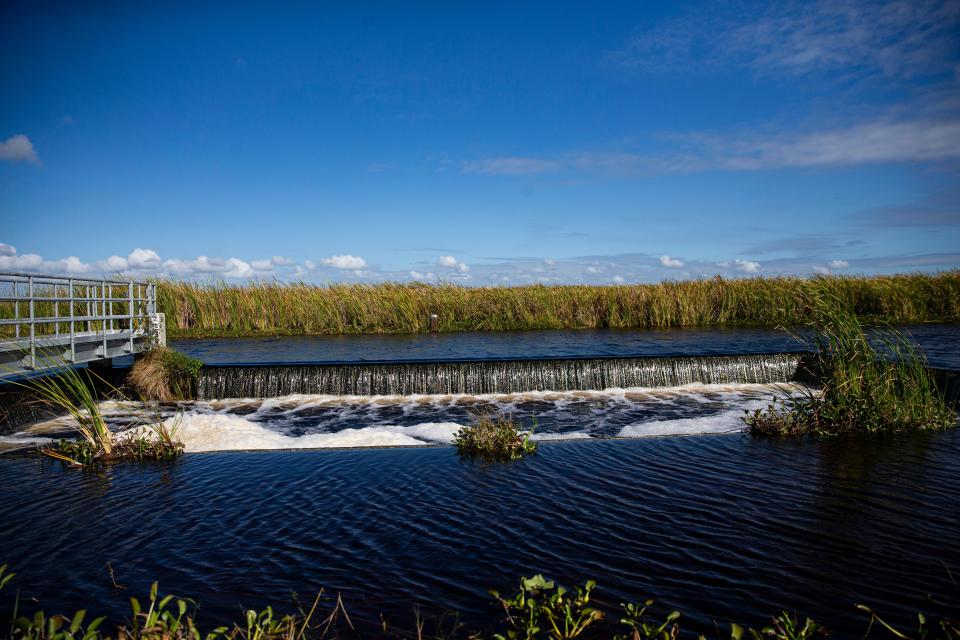 Water flows through a structure that is part of the The Lake Hicpochee Storage and Hydrologic Enhancement Project built by the South Florida Water Management District near Moore Haven on Wednesday, Oct. 25, 2023.