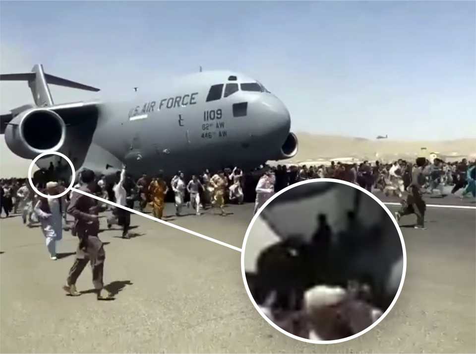 Hundreds of people run alongside a U.S. Air Force C-17 transport plane as it moves down a runway of the international airport, in Kabul, Afghanistan, Monday, Aug.16. 2021. Thousands of Afghans have rushed onto the tarmac at the airport, some so desperate to escape the Taliban capture of their country that they held onto the American military jet as it took off and plunged to death.