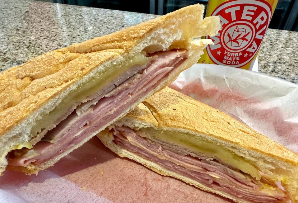 Meet the Sandwich Cubano "Regular" at Miami's Enriqueta Cuban sandwich shop. It is one of three varieties of Cuban sandwiches sold at the authentic spot.