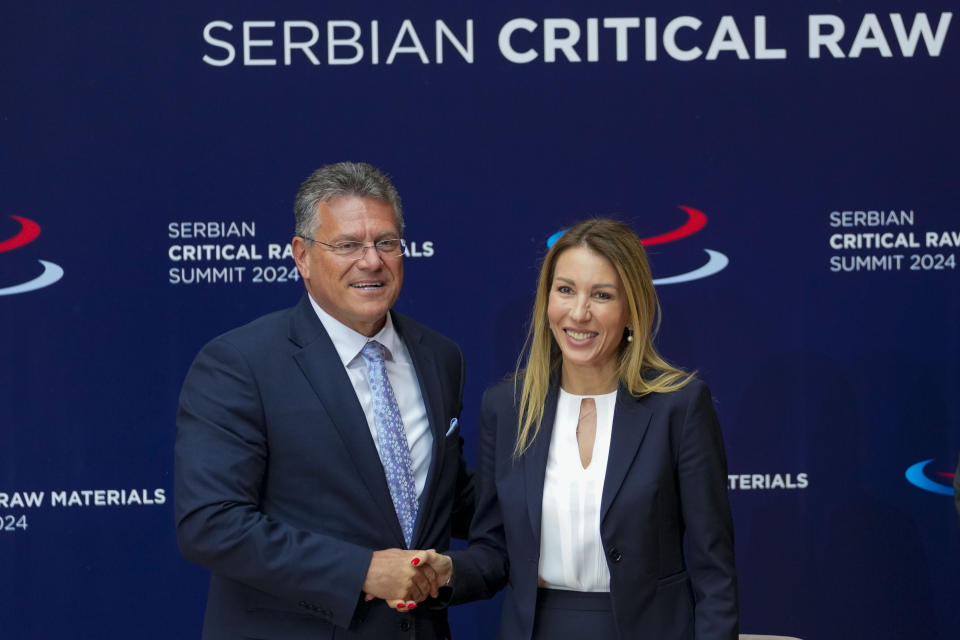 FILE - European Commission Vice President Maros Sefcovic, left, shakes hands with Serbia's Mining and Energy Minister Dubravka Djedovic Handanovic after a signing ceremony at the Serbia Palace in Belgrade, Serbia, on July 19, 2024. (AP Photo/Darko Vojinovic, File)