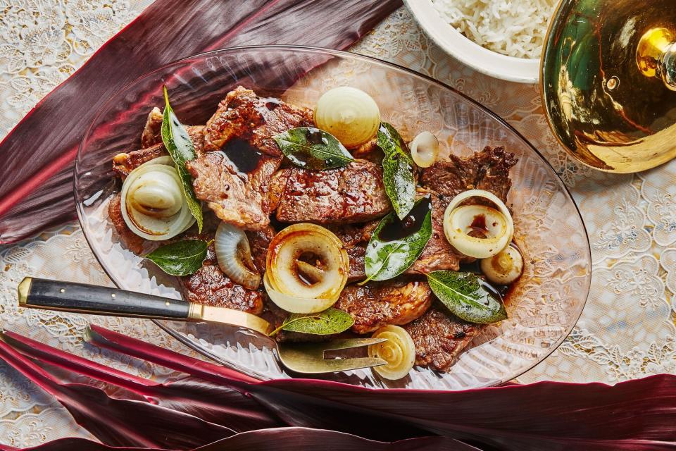 Filipino-Style Beef Steak with Onion and Bay Leaves