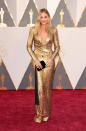 Margot Robbie doesn't need to be nominated for an Oscar this year as she is channeling the statue with this truly breathtaking golden goddess Diane Von Furstenberg dress.