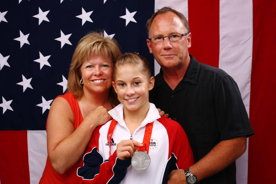 Shawn Johnson (C) of the United States poses with her parents Teri and Doug Johnson after placing second in the Women's all around Gymnastics event in the NBC Today Show Studio at the Beijing 2008 Olympic Games on August 15, 2008 in Beijing, China.