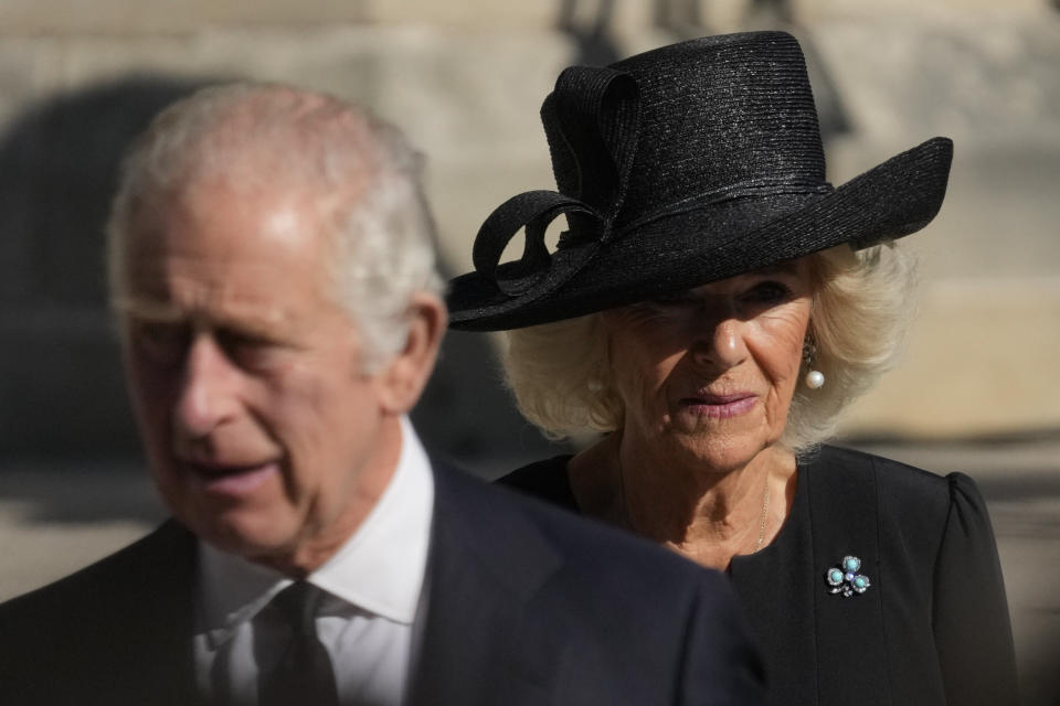 Camilla, the Queen Consort, and Britain's King Charles III leave the St. Anne's Cathedral at the end of a Service of Reflection for the life of Her Majesty The Queen Elizabeth in Belfast, Tuesday, Sept. 13, 2022. (AP Photo/Gregorio Borgia)