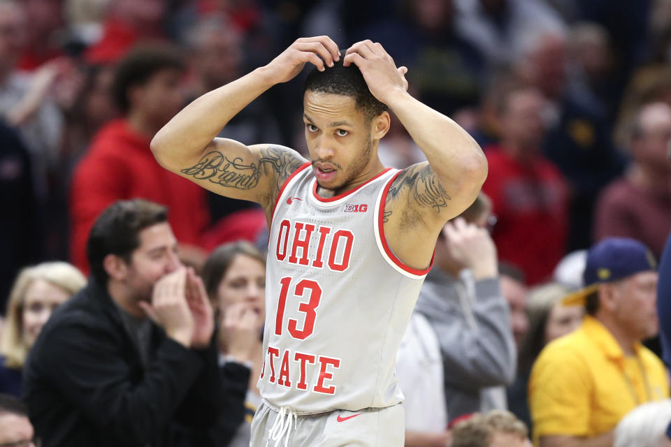 Ohio State's CJ Walker reacts during the second half of an NCAA college basketball game against West Virginia Sunday, Dec. 29, 2019, in Cleveland. West Virginia defeated Ohio State 67-59. (AP Photo/Ron Schwane)
