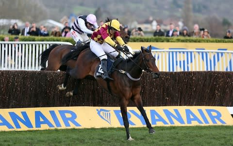 Siruh Du Lac ridden by Lizzie Kelly on their way to victory in the Brown Advisory & Merriebelle Stable Plate Handicap Chase during St Patrick's Thursday of the 2019 Cheltenham Festival at Cheltenham Racecourse - Credit: Nigel French/PA Wire