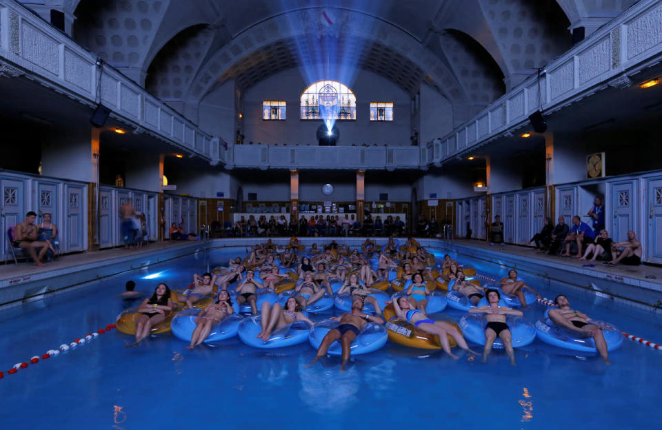 People attend the screening of the film “Jaws” by director Steven Spielberg, screened at Strasbourg public baths during the European Fantastic Film Festival, in Strasbourg