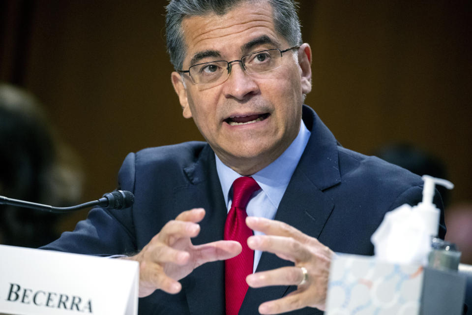 FILE - Secretary of Health and Human Services Xavier Becerra testifies before a Senate Health, Education, Labor, and Pensions Committee hearing, Sept. 30, 2021 on Capitol Hill in Washington. People in crisis and those trying to help them will have a new three-digit number, 988, to reach the national suicide prevention network starting in July. Federal health officials on Monday are announcing more than $280 million to smooth the transition from the current 10-digit number. (Shawn Thew/Pool via AP)