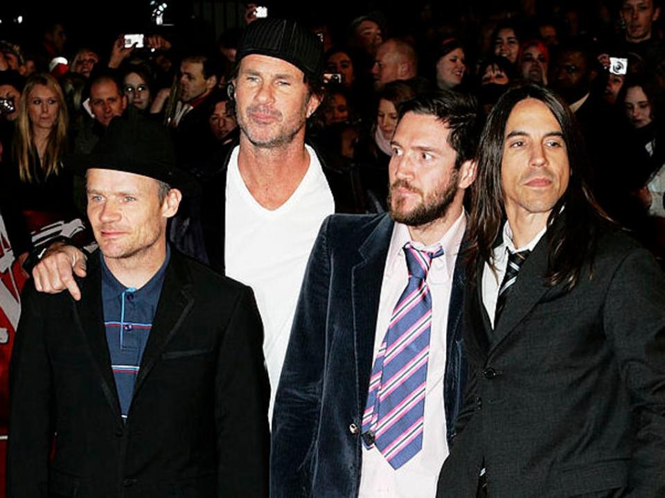 John Frusciante (second from right) stands alongside Red Hot Chili Peppers bandmates Flea, Chad Smith and Anthony Kiedis at the 2007 Brit Awards (Gareth Cattermole/Getty Images)