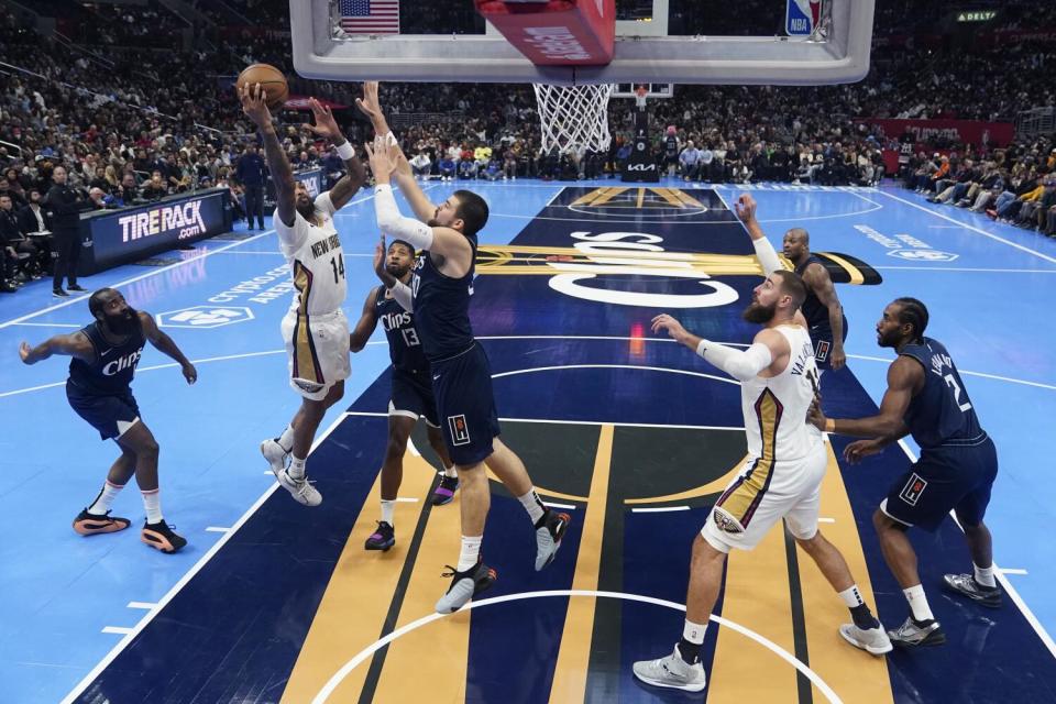 Pelicans forward Brandon Ingram shoots over Clippers center Ivica Zubac during Friday.