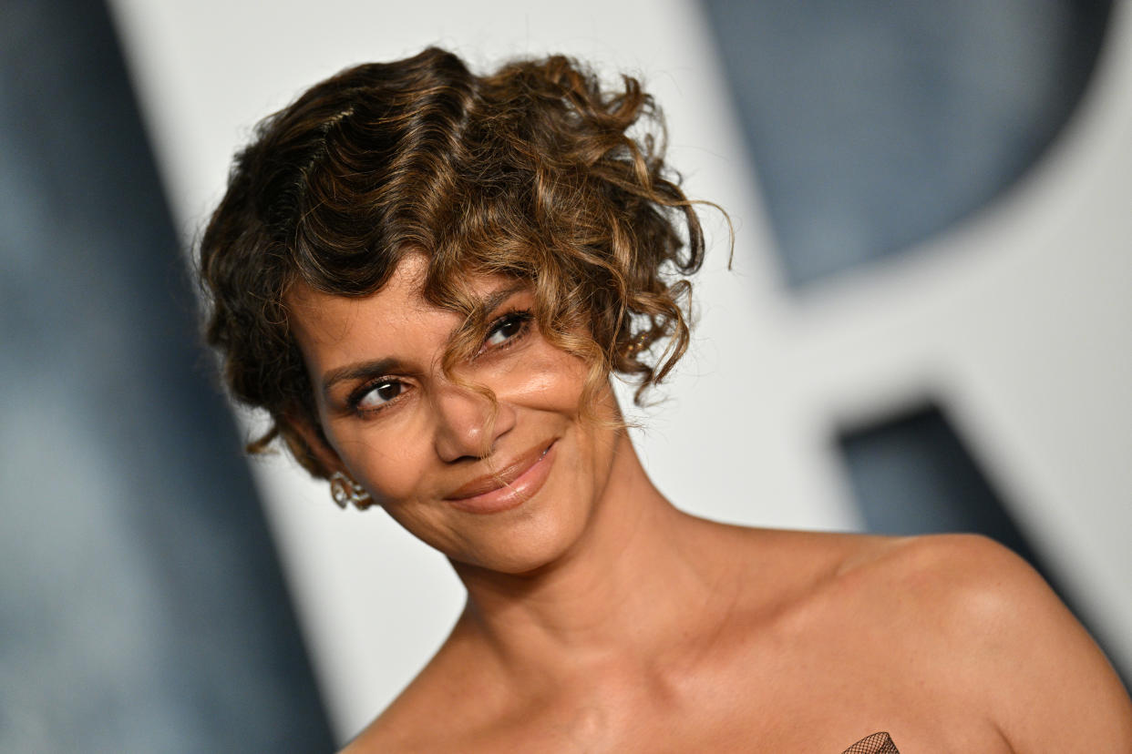 Halle Berry stuns in sun-soaked nude photo on balcony, and responds to ageist comment via Twitter/ @halleberry