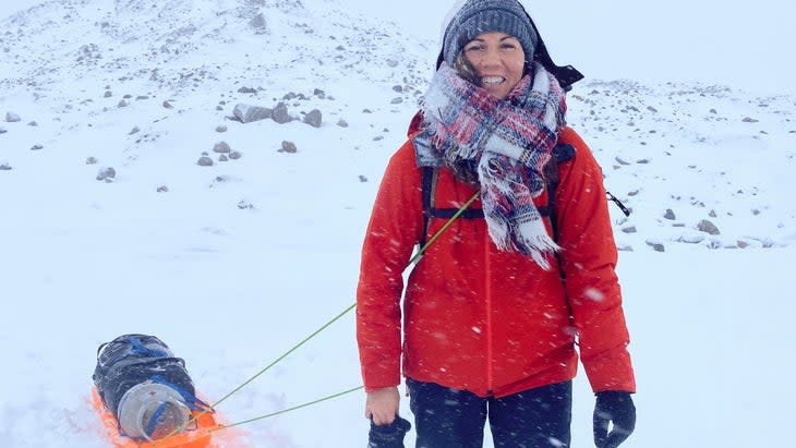 woman snow sled