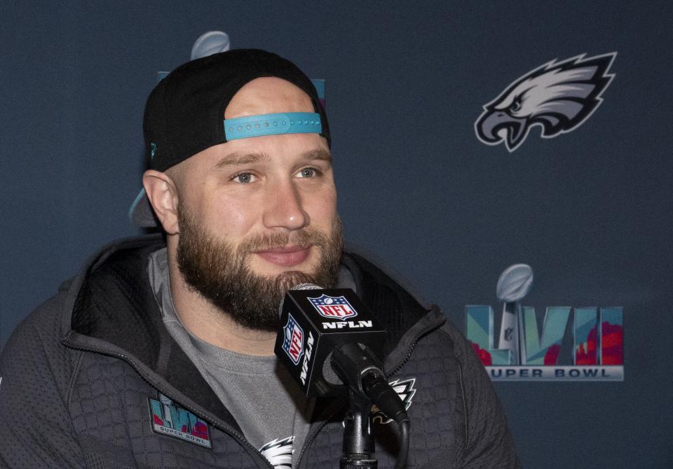 Philadelphia Eagles offensive tackle Lane Johnson (65) answers questions from the media during team availability at Sheraton Grand at Wild Horse Pass in Phoenix on Feb. 7, 2023.
