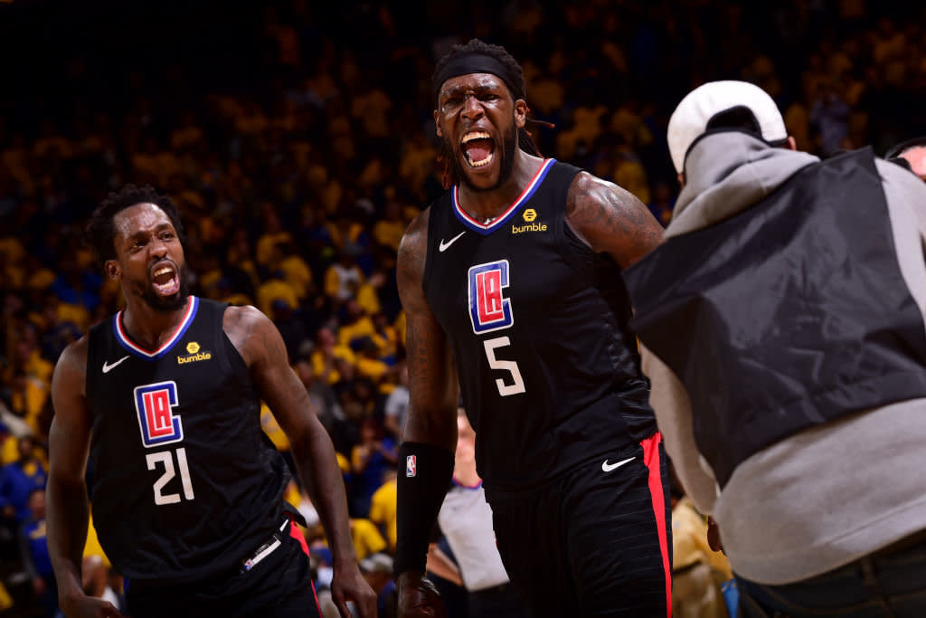 Clippers Patrick Beverley and Montrezl Harrell celebrate their 31-point comeback against the Warriors. (Getty Images)