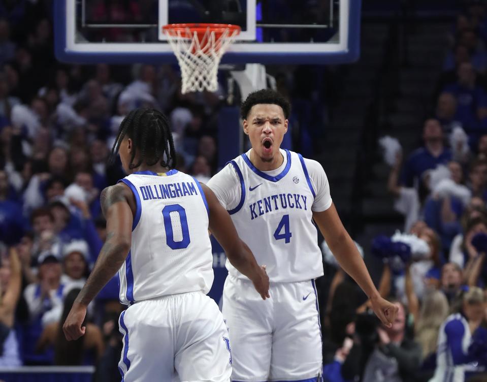 Kentucky’s Tre Mitchell celebrates with Rob Dillingham during a game against Texas A&M-Commerce at Rupp Arena. Nov. 10, 2023