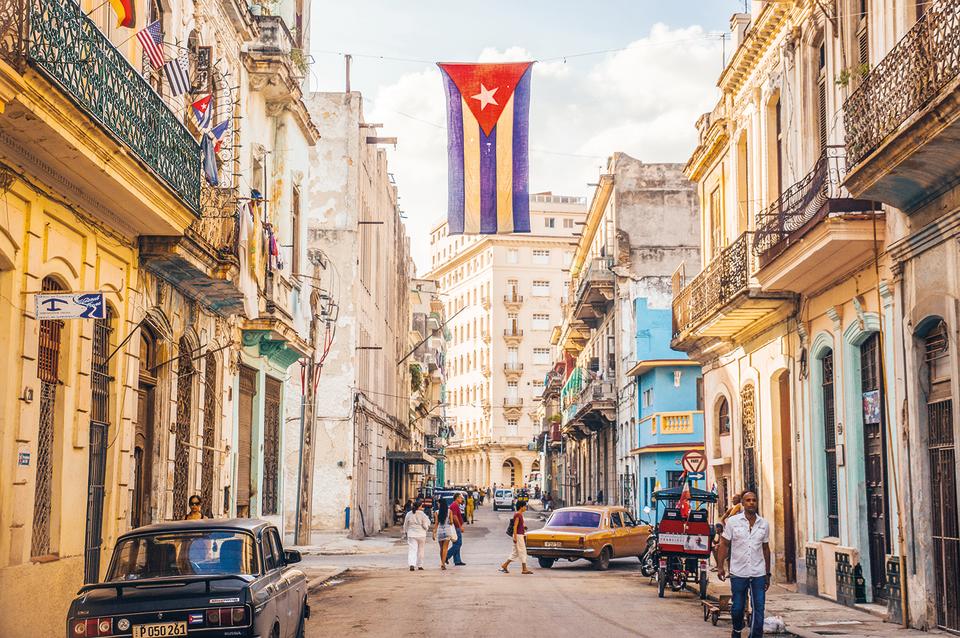 <p>A capital city wouldn’t necessarily strike you as a top road trip destination but Havana’s Malecon, a road curving around its waterfront, is the best place to catch unforgettable sunsets and people watch [Photo: Lonely Planet] </p>