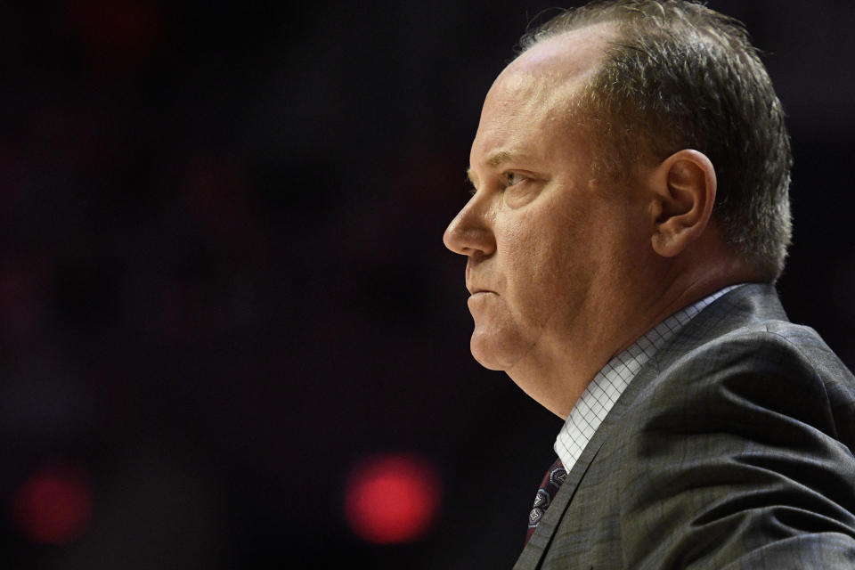 Wisconsin coach Greg Gard looks on during the first half of an NCAA college basketball game against Illinois, Saturday, Jan. 7, 2023, in Champaign, Ill. (AP Photo/Michael Allio)