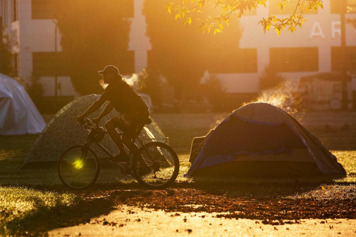 A Vancouver-based research project gave homeless individuals cash and tracked their progress for a year. The 50 cash transfer recipients not only found stable housing, they freed up space in shelters and, according to project data, saved the shelter system $8,100 per person over those 12 months. (Ben Nelms/CBC - image credit)