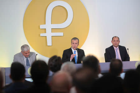 Venezuela's Vice President Tareck El Aissami (C) speaks during a meeting with ministers in Caracas, Venezuela March 6, 2018. Miraflores Palace/Handout via REUTERS